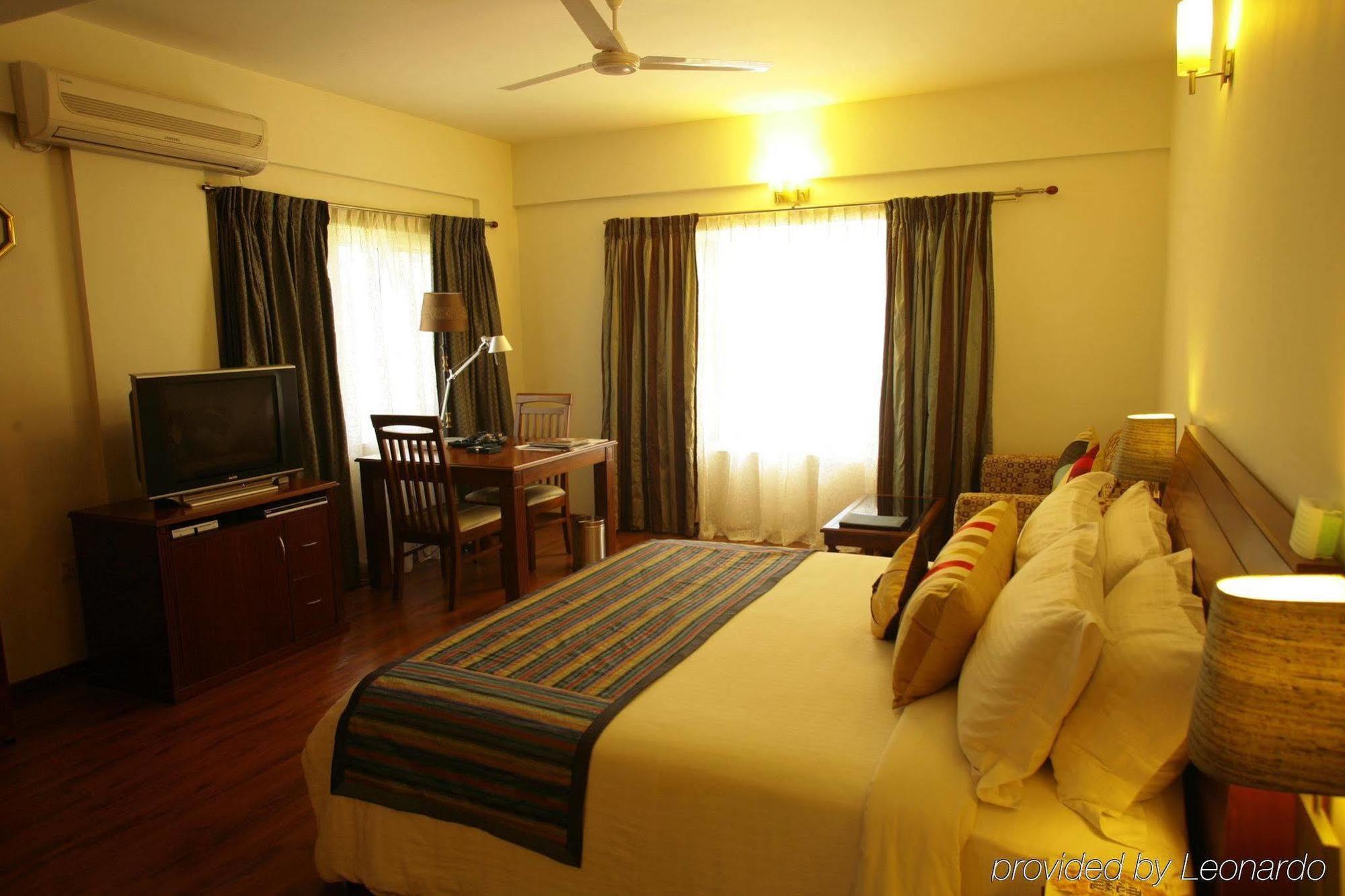 Hotel Justa Off Mg Road à Bangalore Chambre photo